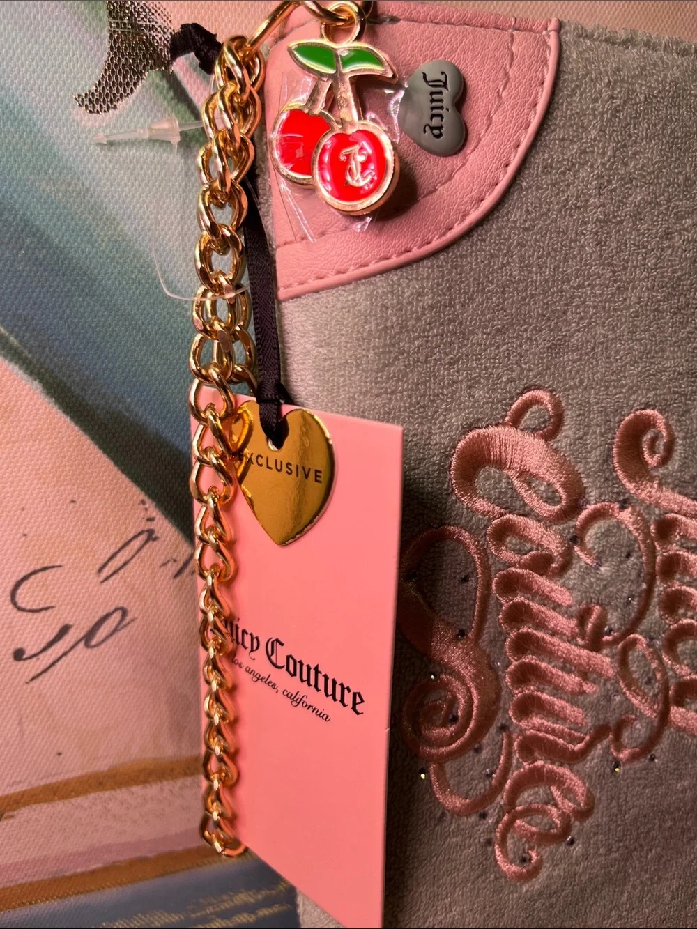 Juicy Couture Pink and Frosty Green Embroidered Chain zip wallet